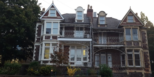 The Temporary Staffing Service building at 65 Woodland Road, with its ornate wrought iron balconies. 